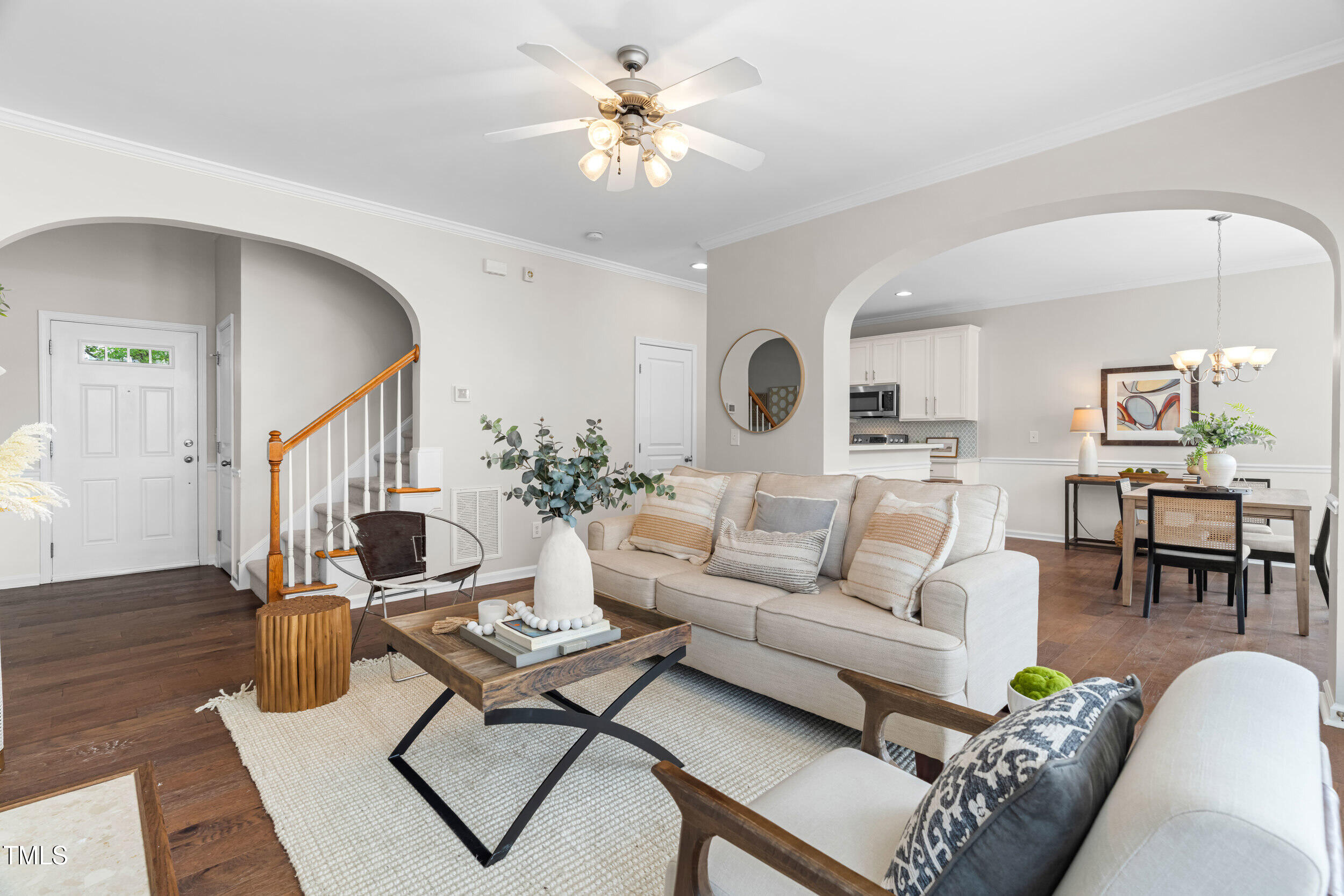 2816 Prospect Parkway Durham, NC 27703 - Photo 8 of 38 a living room with furniture a table and wooden floor