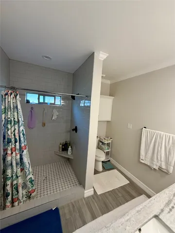 a view of livingroom with furniture and workspace