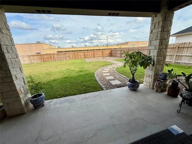a view of a house with a big yard