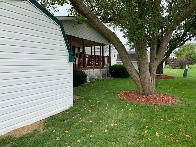 819 South 9th Street DeKalb, IL 60115 - Photo 17 of 20 a view of a backyard with large trees