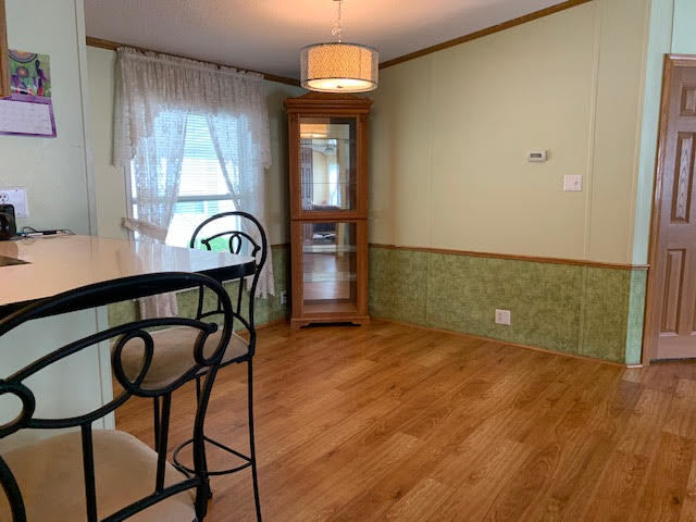 819 South 9th Street DeKalb, IL 60115 - Photo 6 of 20 a view of a room with furniture window and wooden floor