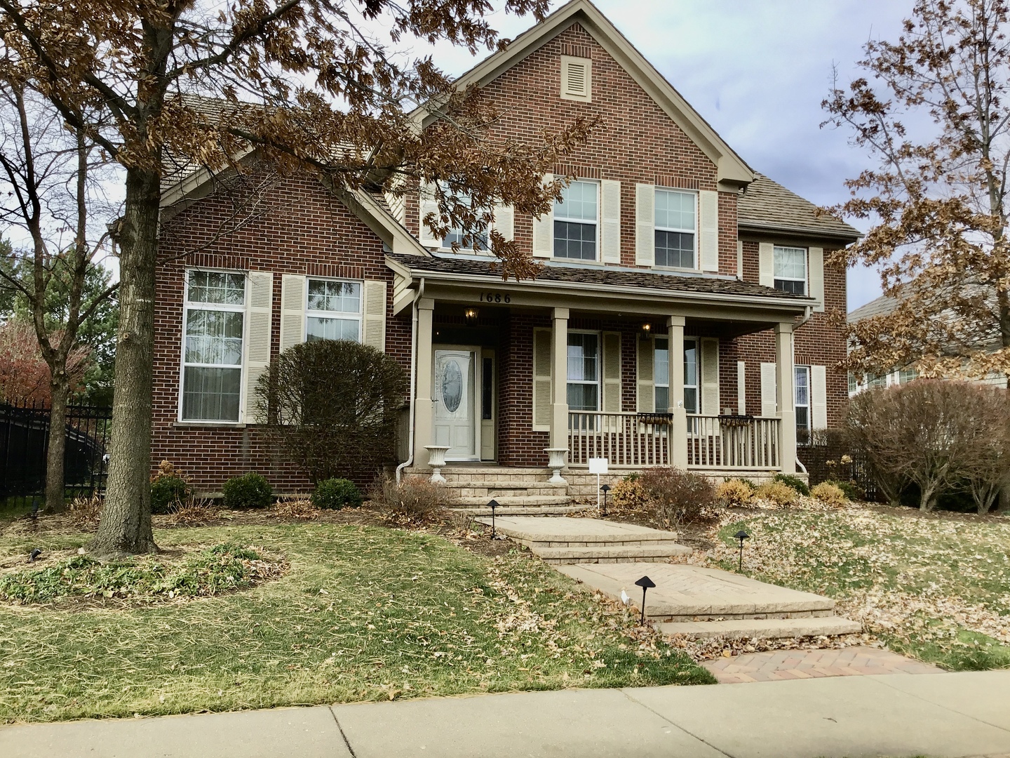 1686 Constitution Drive Glenview, IL 60026 - Photo 1 of 22 front view of a house with a yard