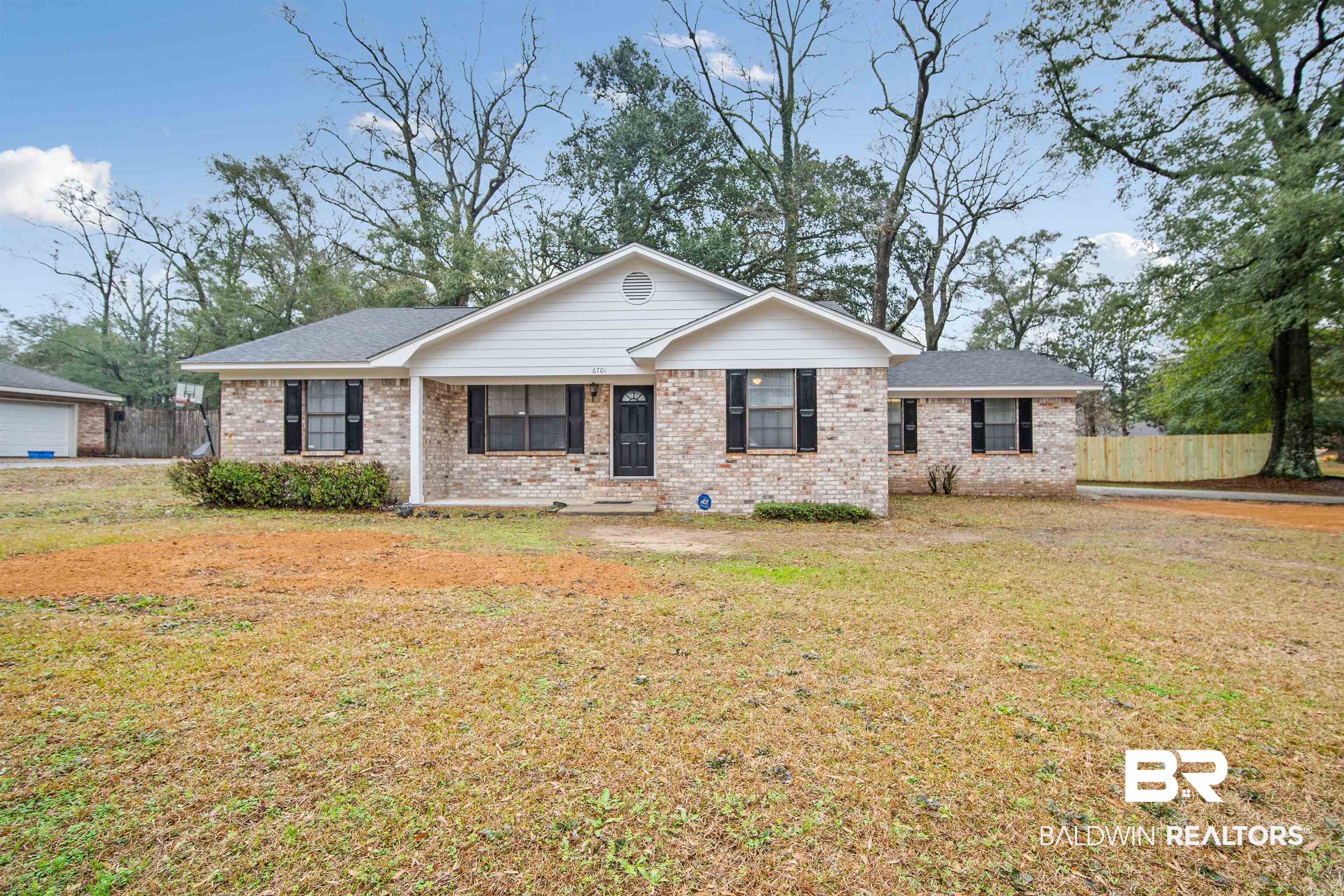 6701 Howells Ferry Road Mobile, AL 36618 - Photo 1 of 25 Ranch-style home with a front lawn