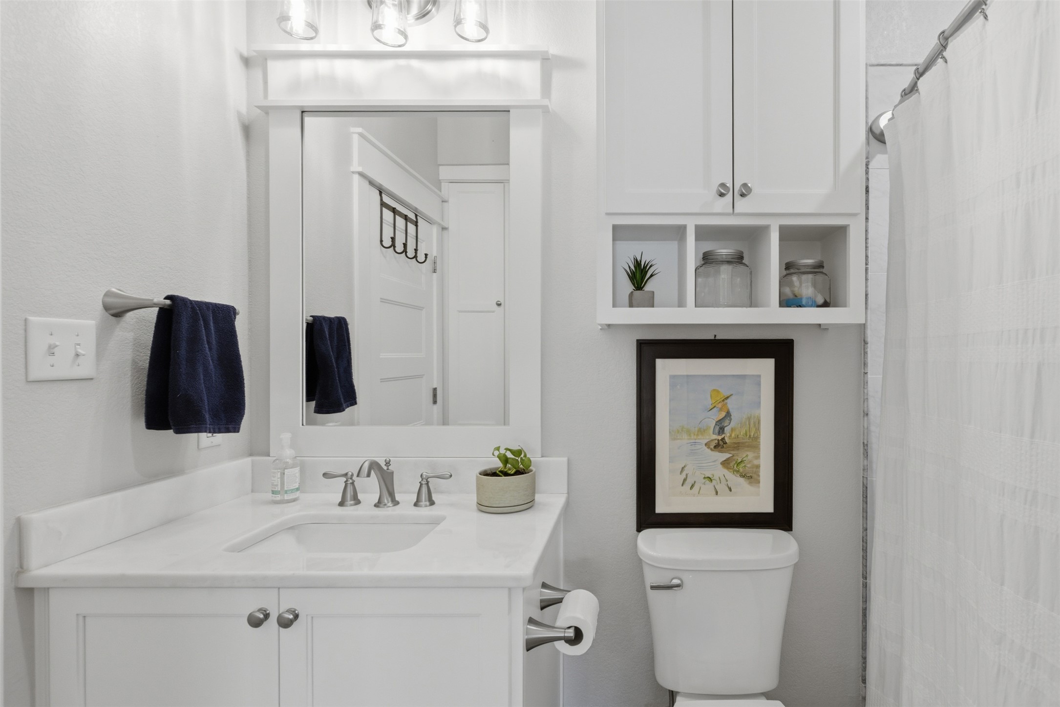 1804 Tanner Loop Taylor, TX 76574 - Photo 24 of 40 The second full bath is charming while offering great storage space.