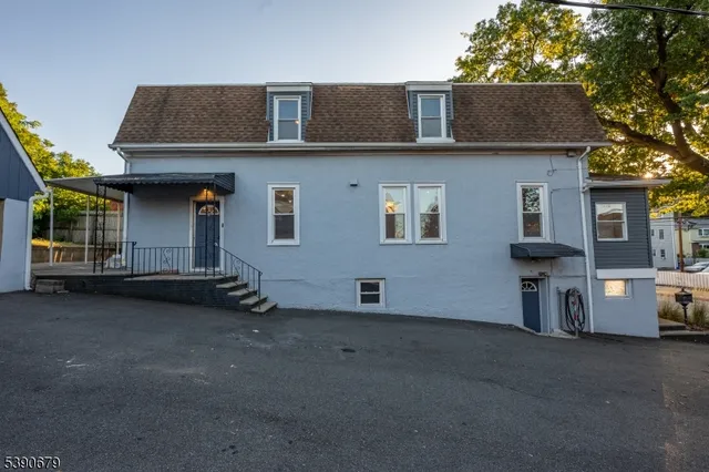 a front view of a house with a garage