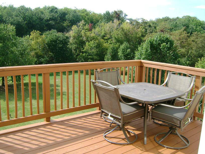 1741 Meadows Road Vinton, VA 24179 - Photo 21 of 23 a view of a balcony with wooden floor and outdoor seating