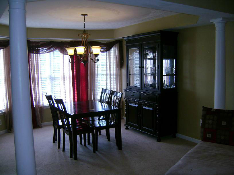 1741 Meadows Road Vinton, VA 24179 - Photo 5 of 23 a view of a dining room with furniture and window