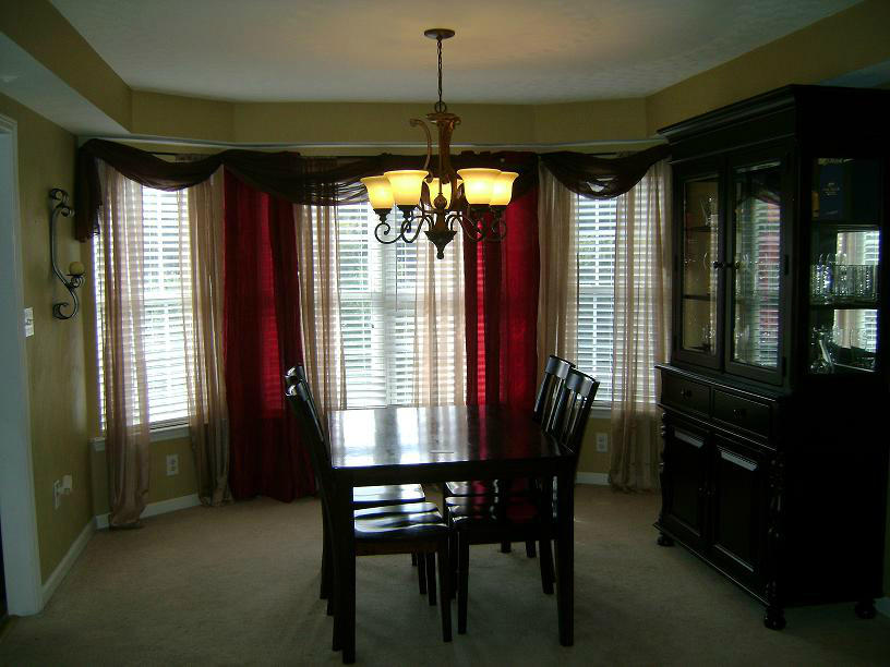 1741 Meadows Road Vinton, VA 24179 - Photo 6 of 23 a view of a dining room with furniture and window