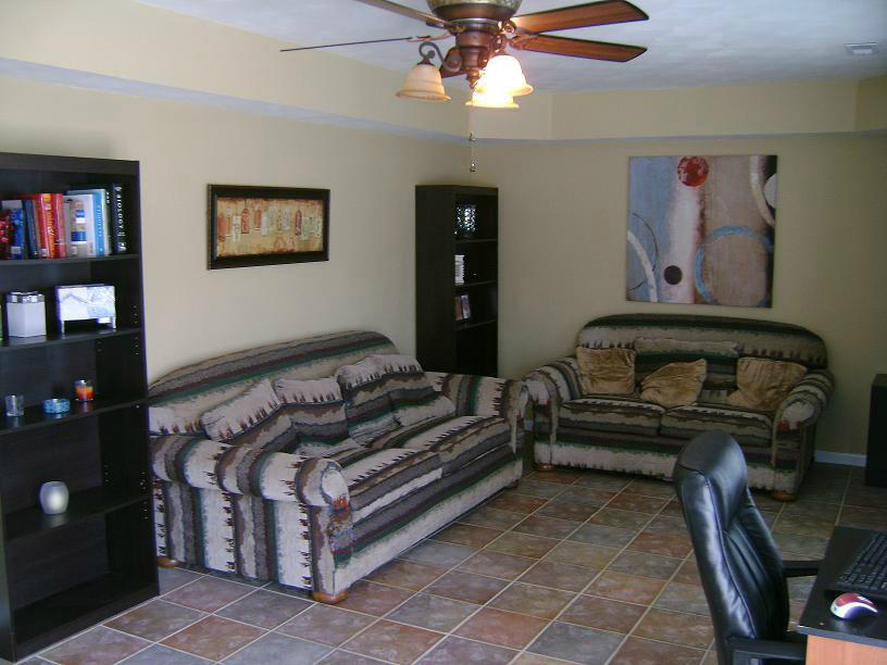 1741 Meadows Road Vinton, VA 24179 - Photo 10 of 23 a bedroom with furniture and a chandelier