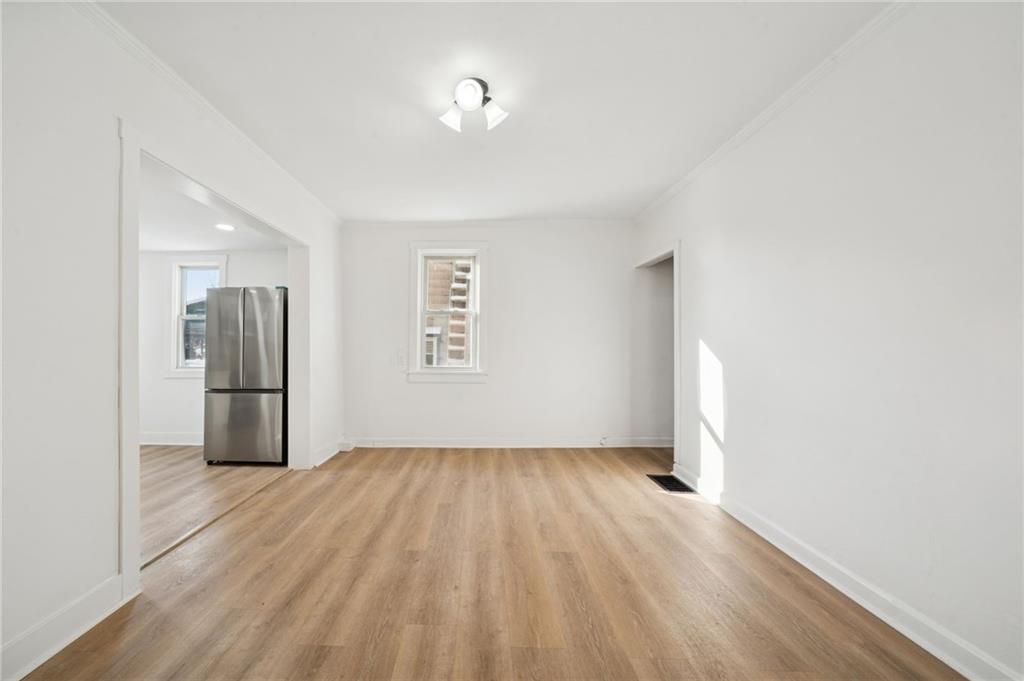 216 Whipple Street Pittsburgh, PA 15218 - Photo 12 of 29 a view of an empty room with a window