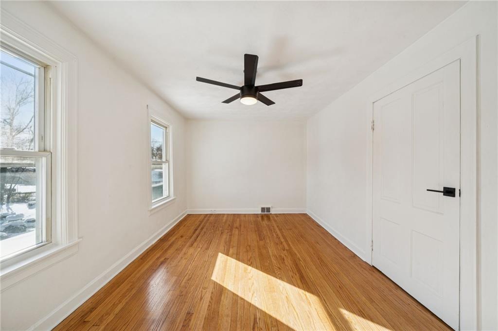 216 Whipple Street Pittsburgh, PA 15218 - Photo 15 of 29 a view of a room with a window and a ceiling fan