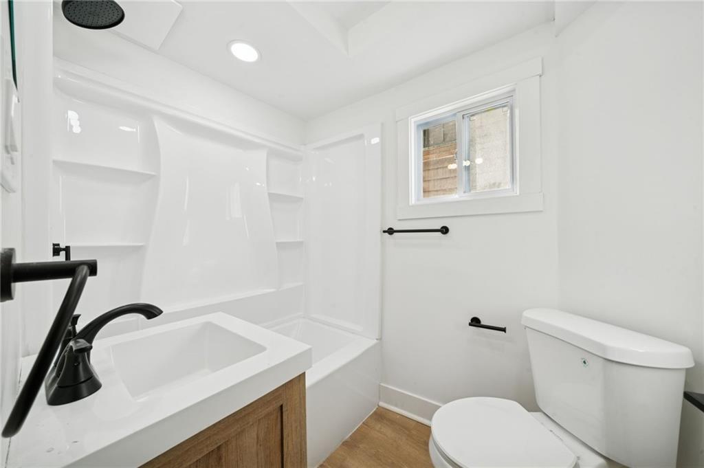 216 Whipple Street Pittsburgh, PA 15218 - Photo 19 of 29 a bathroom with a sink toilet and shower