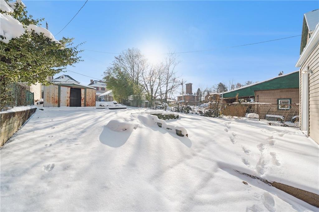 216 Whipple Street Pittsburgh, PA 15218 - Photo 23 of 29 a view of a house with a snow on the road