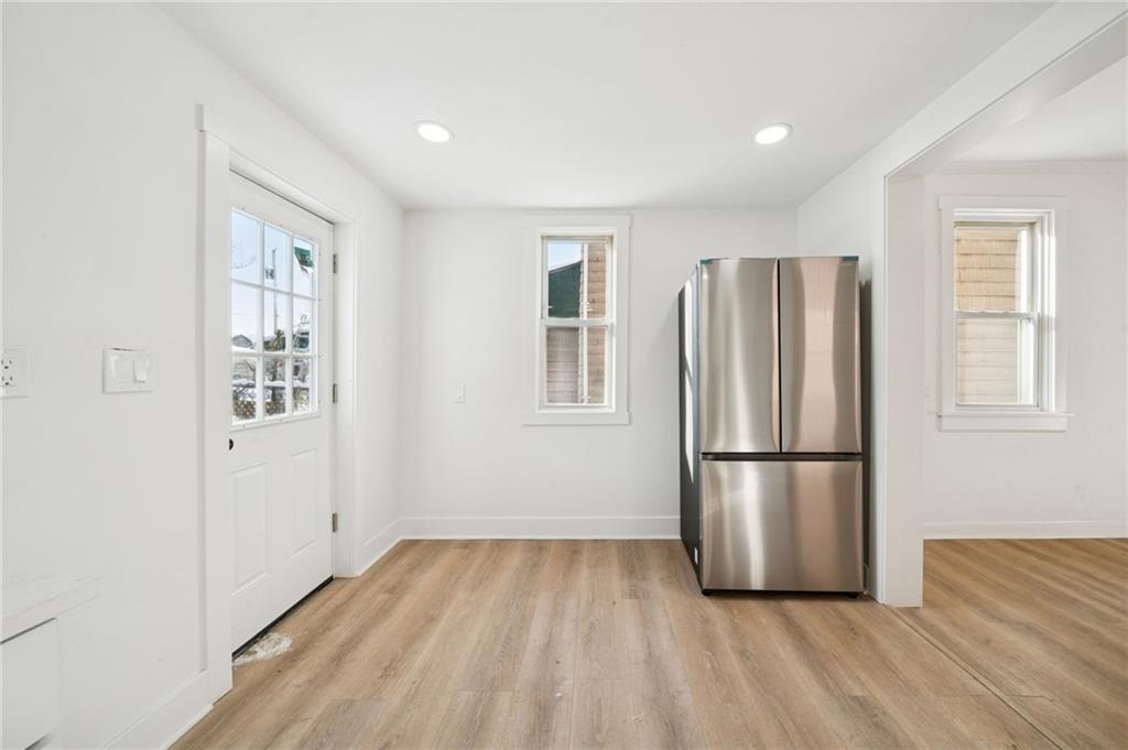 216 Whipple Street Pittsburgh, PA 15218 - Photo 7 of 29 a view of wooden floor and windows in a room