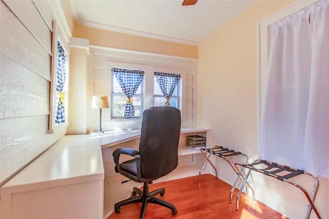 a bathroom with a sink toilet and mirror