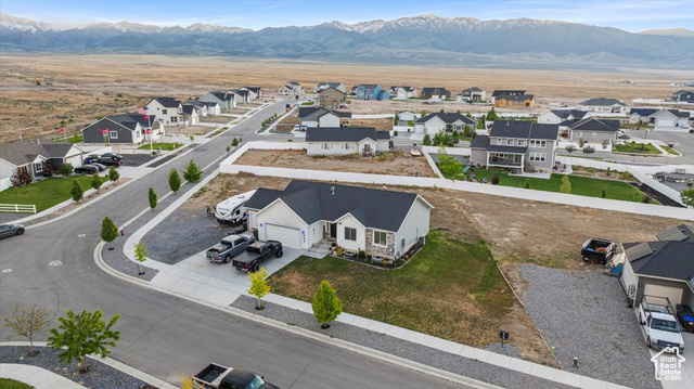 464 South Trejo Rdg Road Grantsville, UT 84029 - Photo 27 of 33 Aerial view of residential area with a mountainous background