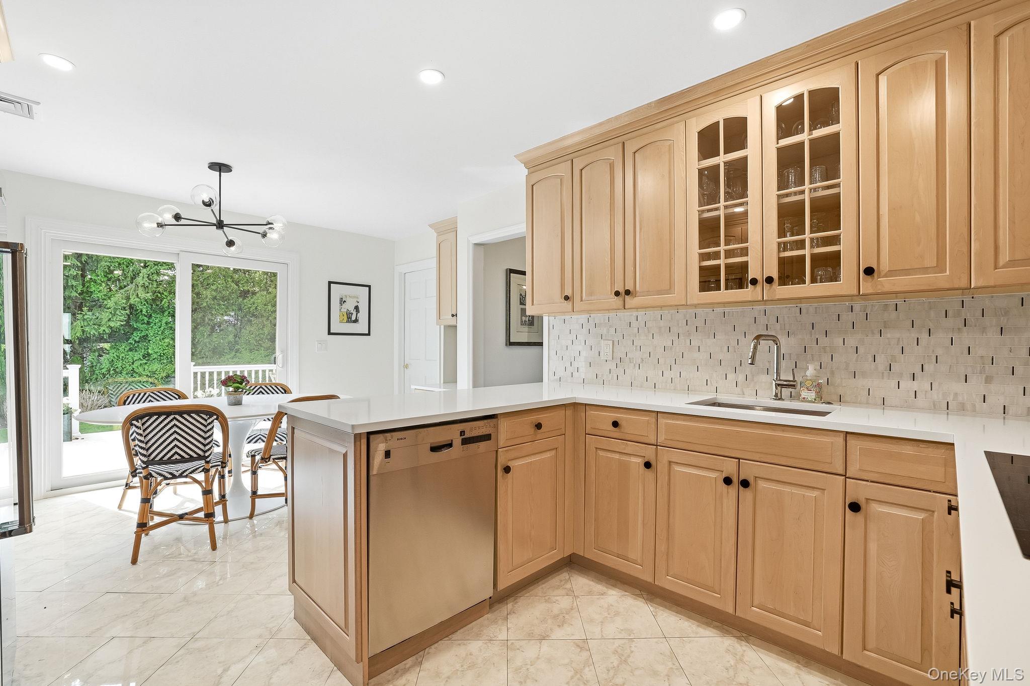 80 Highfield Road Harrison, NY 10528 - Photo 14 of 42 Kitchen and Sun-Filled Breakfast Area