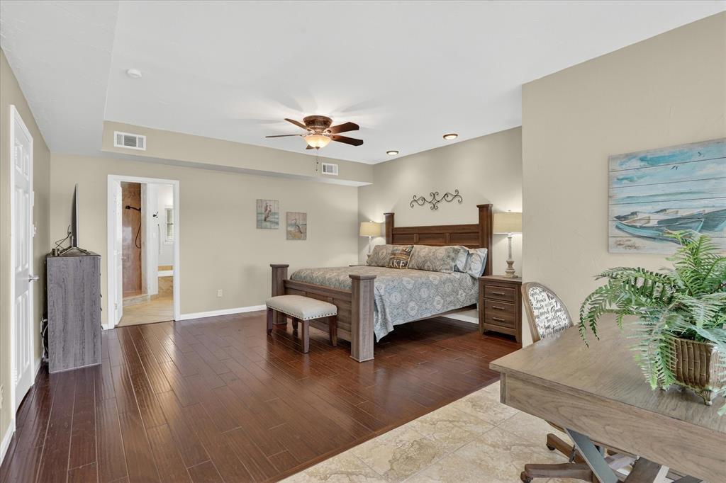 8877 Random Road Fort Worth, TX 76179 - Photo 13 of 40 Spacious room featuring wood-finish flooring, recessed lighting, and a ceiling fan