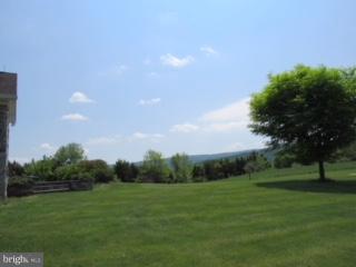 3056 Swift Shoals Road Boyce, VA 22620 - Photo 3 of 29 a view of a grassy field with trees