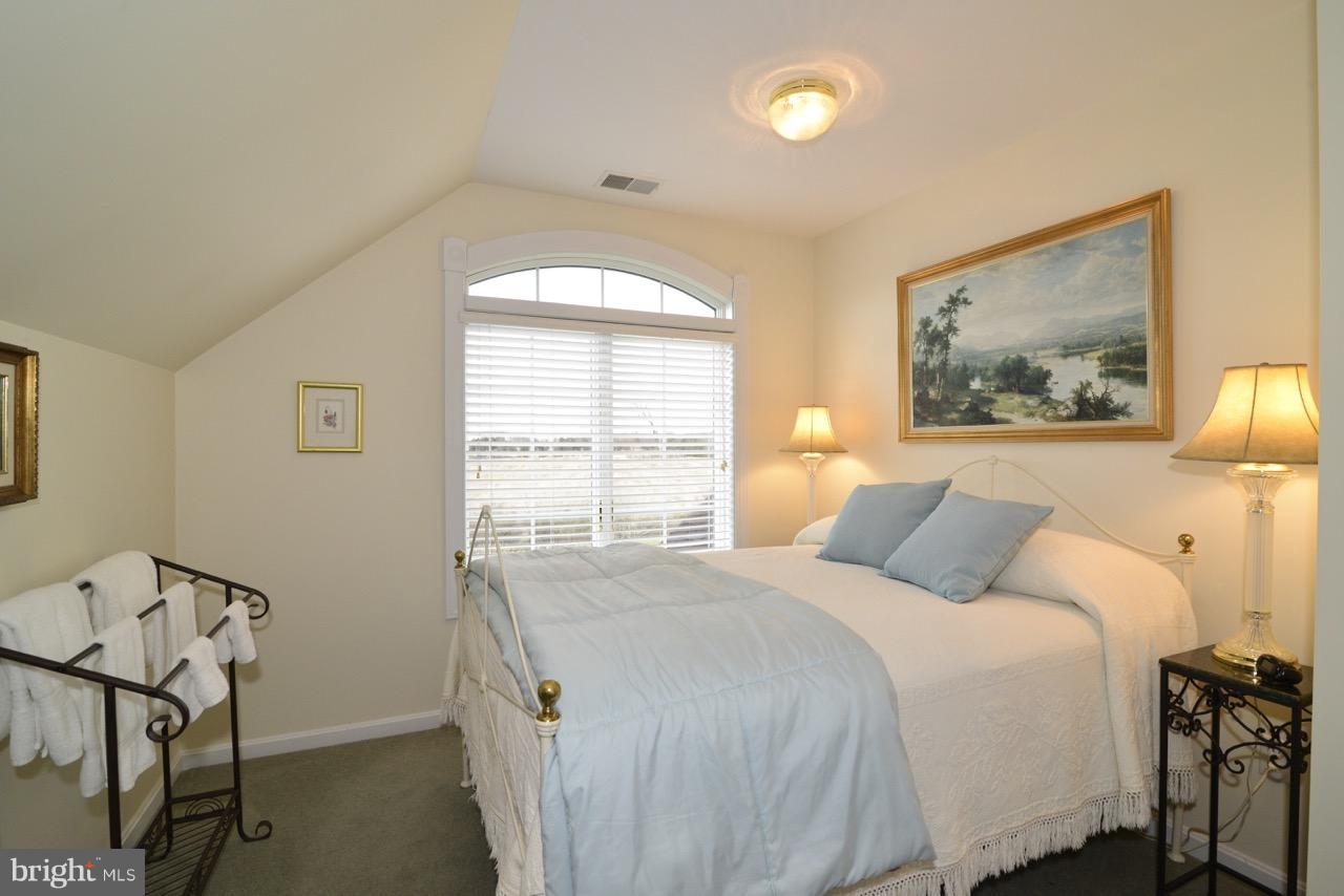 3056 Swift Shoals Road Boyce, VA 22620 - Photo 22 of 29 a bedroom with a bed and window