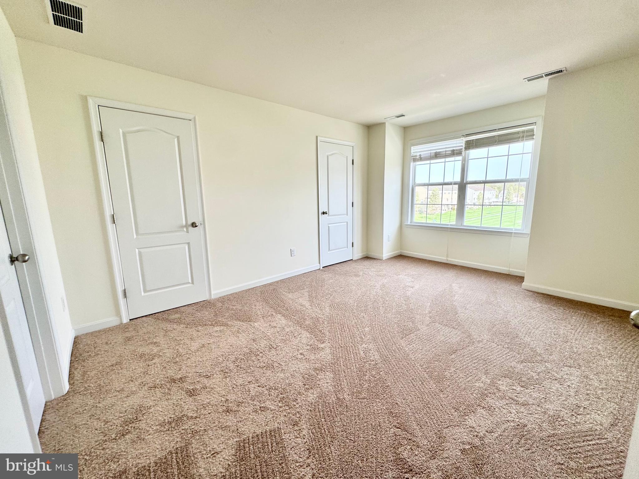 56 Nicholas Drive Dover, DE 19901 - Photo 11 of 23 a view of empty room with window