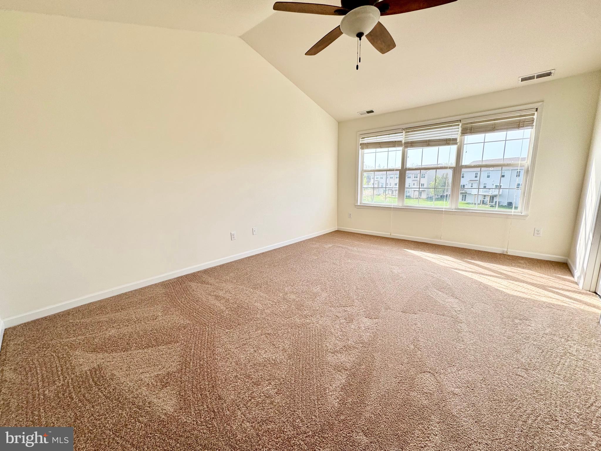 56 Nicholas Drive Dover, DE 19901 - Photo 14 of 23 a view of an empty room with a window