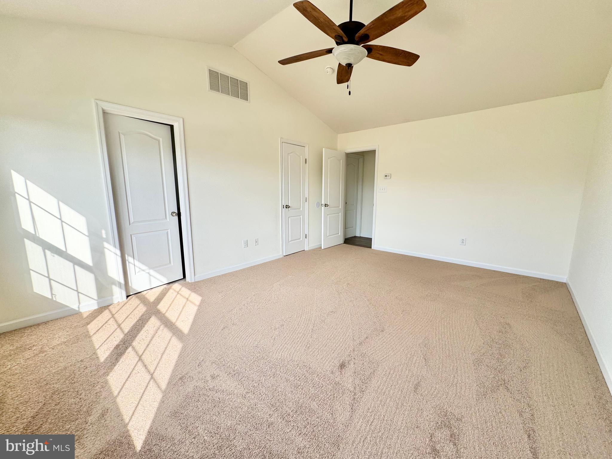 56 Nicholas Drive Dover, DE 19901 - Photo 15 of 23 a view of a big room with wooden floor and windows