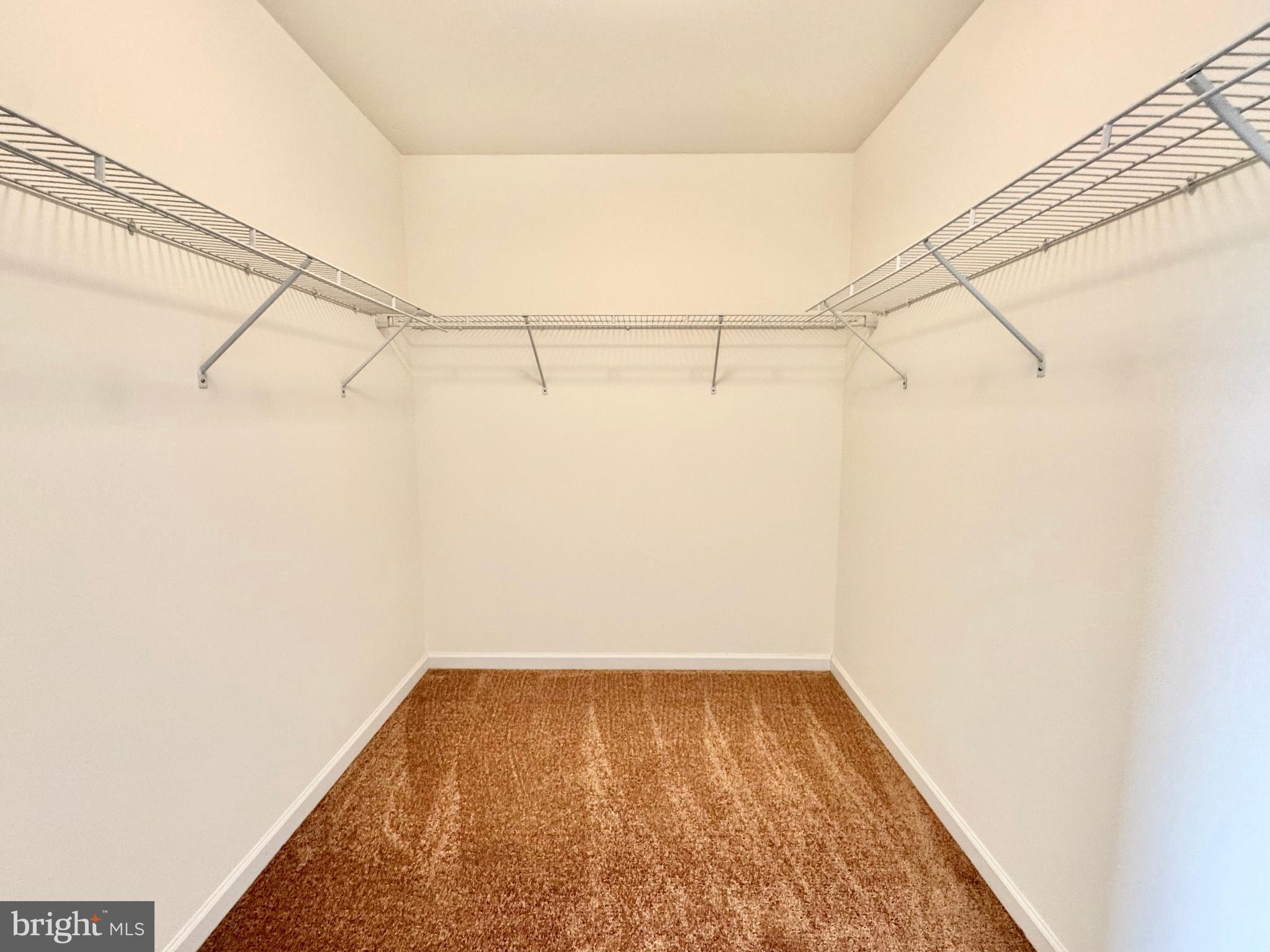 56 Nicholas Drive Dover, DE 19901 - Photo 17 of 23 a view of a room with racks on the wall