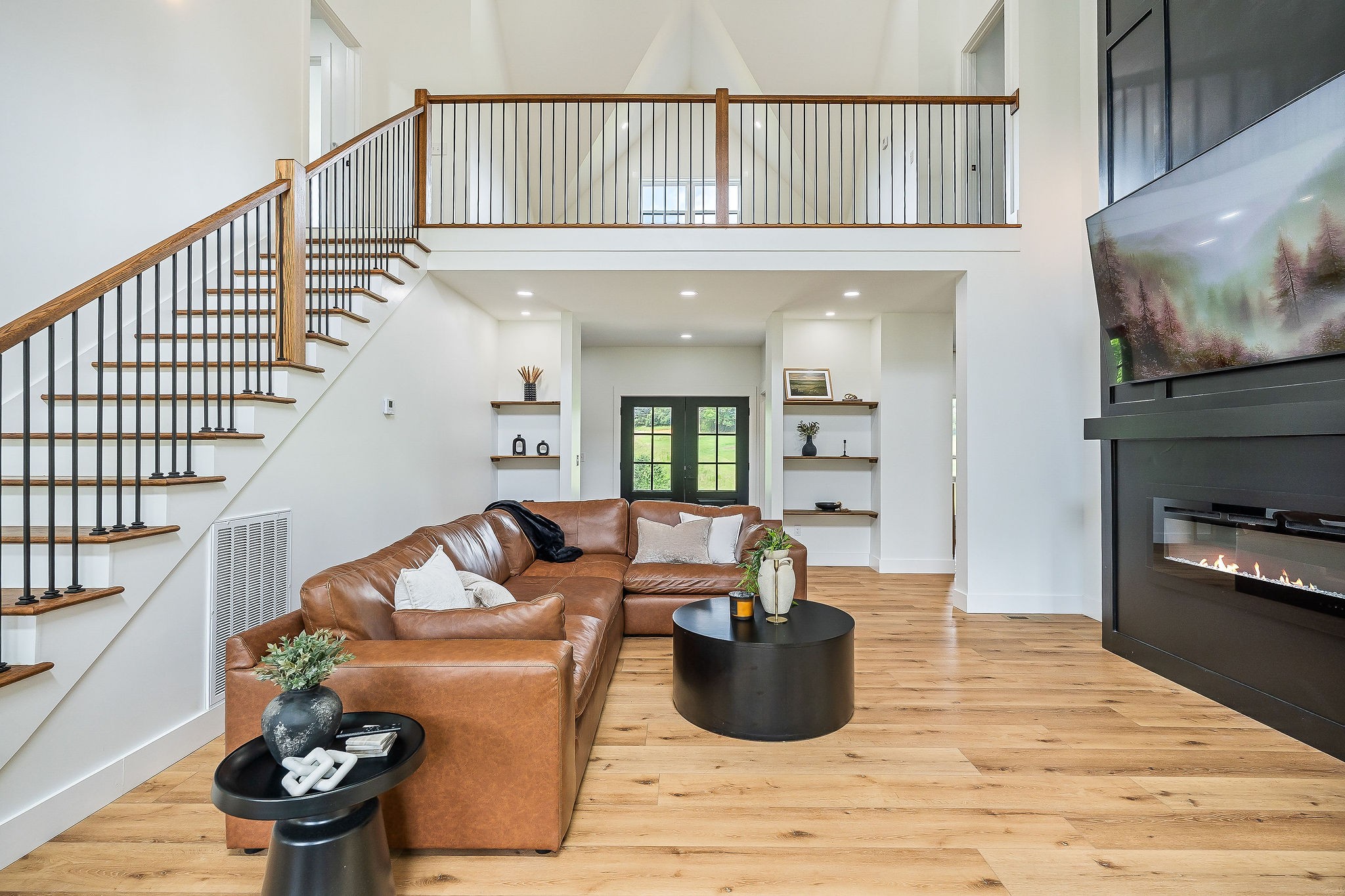 250 Dyer Ridge Road Baxter, TN 38544 - Photo 2 of 44 a living room with furniture and a flat screen tv