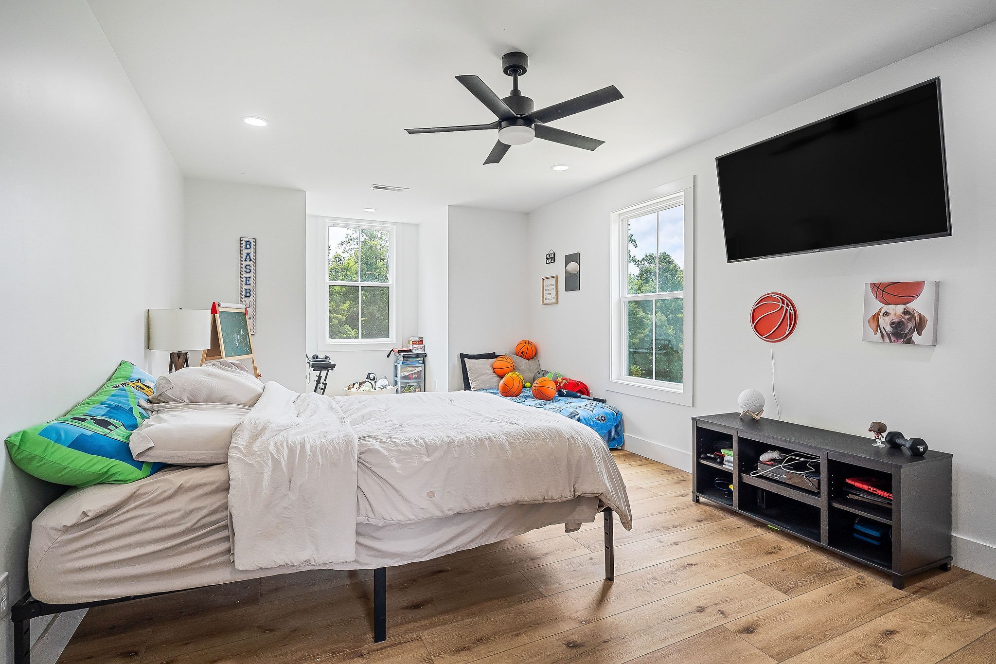 250 Dyer Ridge Road Baxter, TN 38544 - Photo 25 of 44 a bedroom with a bed and a flat screen tv