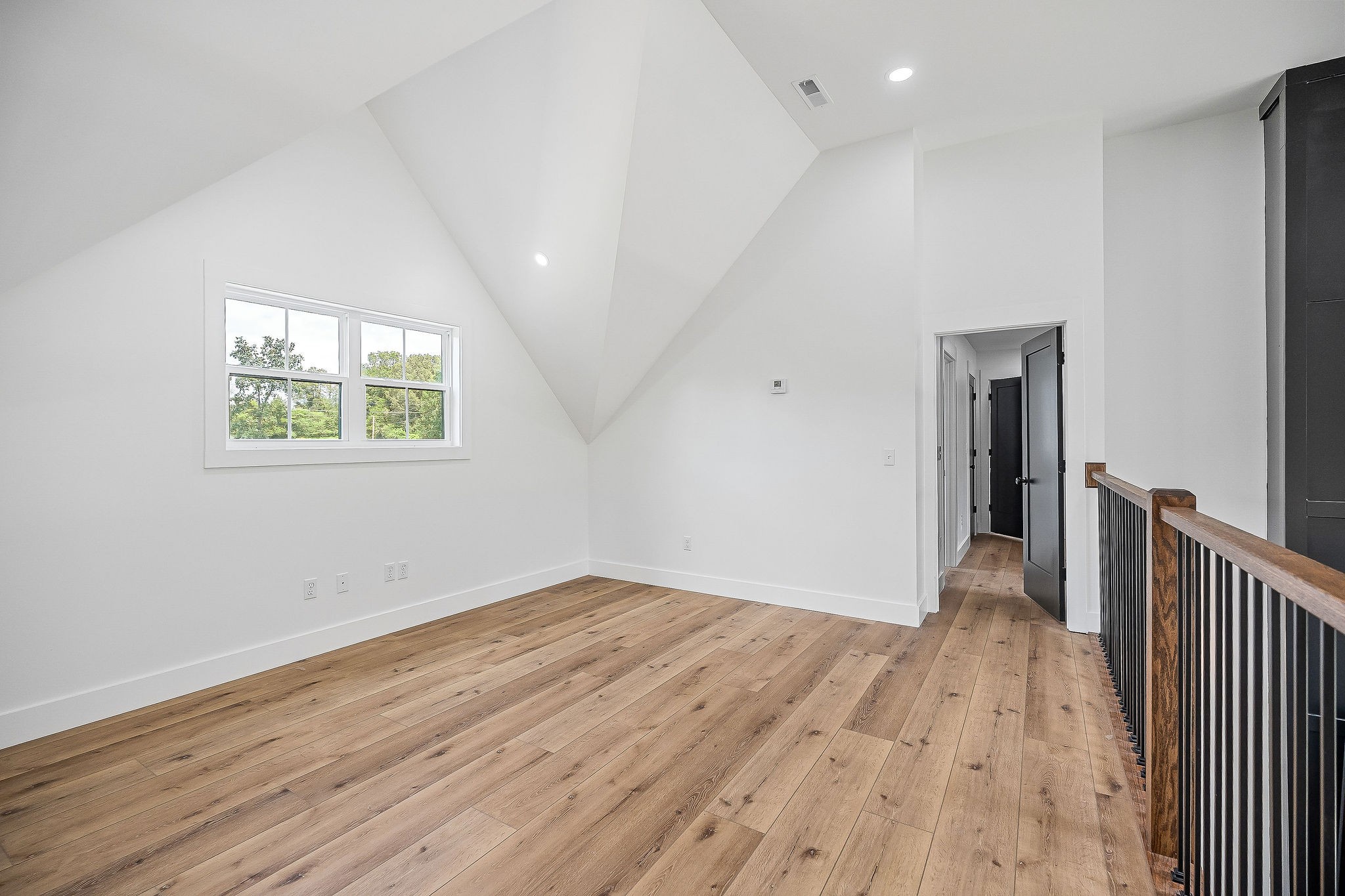 250 Dyer Ridge Road Baxter, TN 38544 - Photo 26 of 45 wooden floor in an empty room with a window
