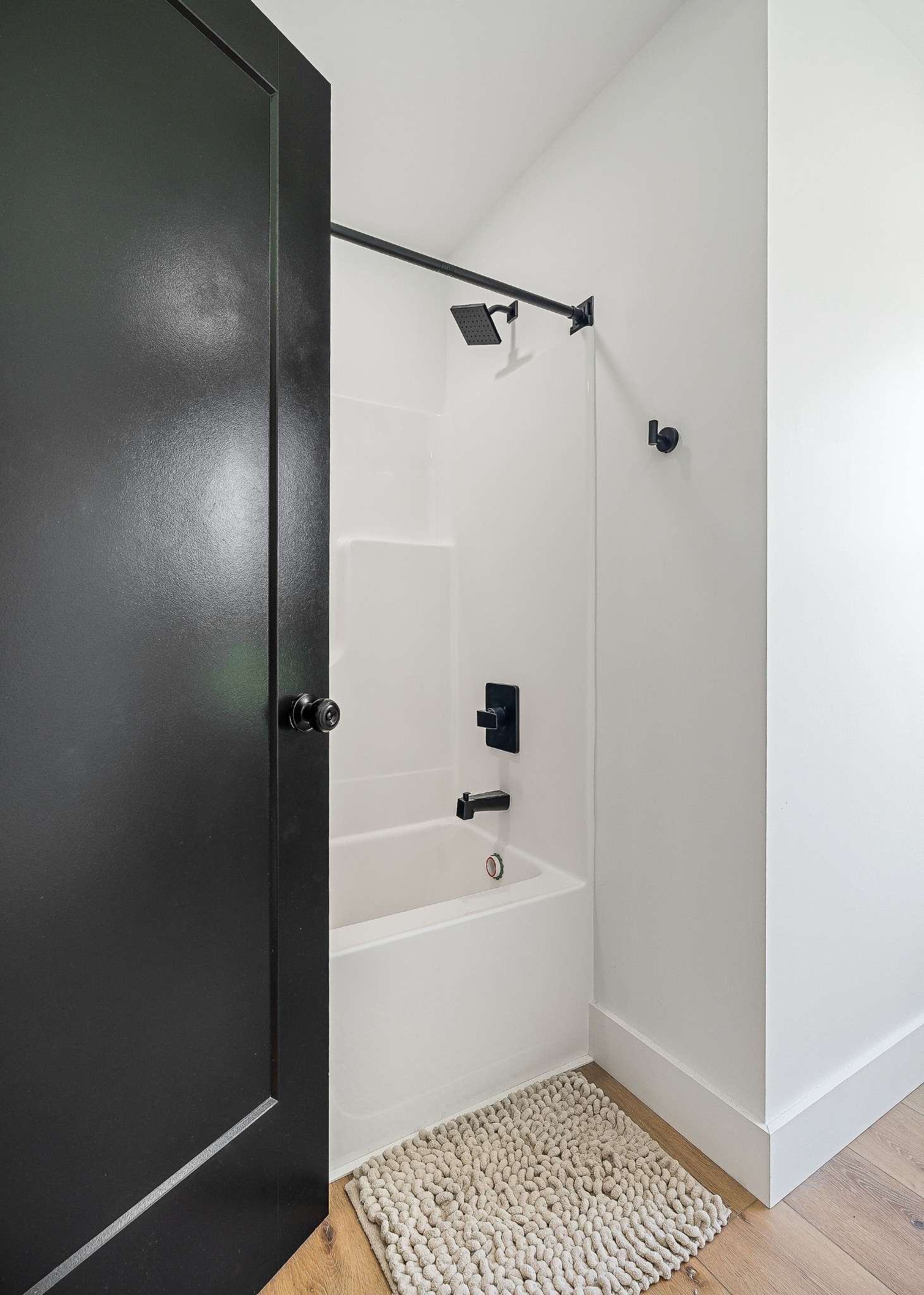 250 Dyer Ridge Road Baxter, TN 38544 - Photo 29 of 45 a bathroom with a bathtub and a shower