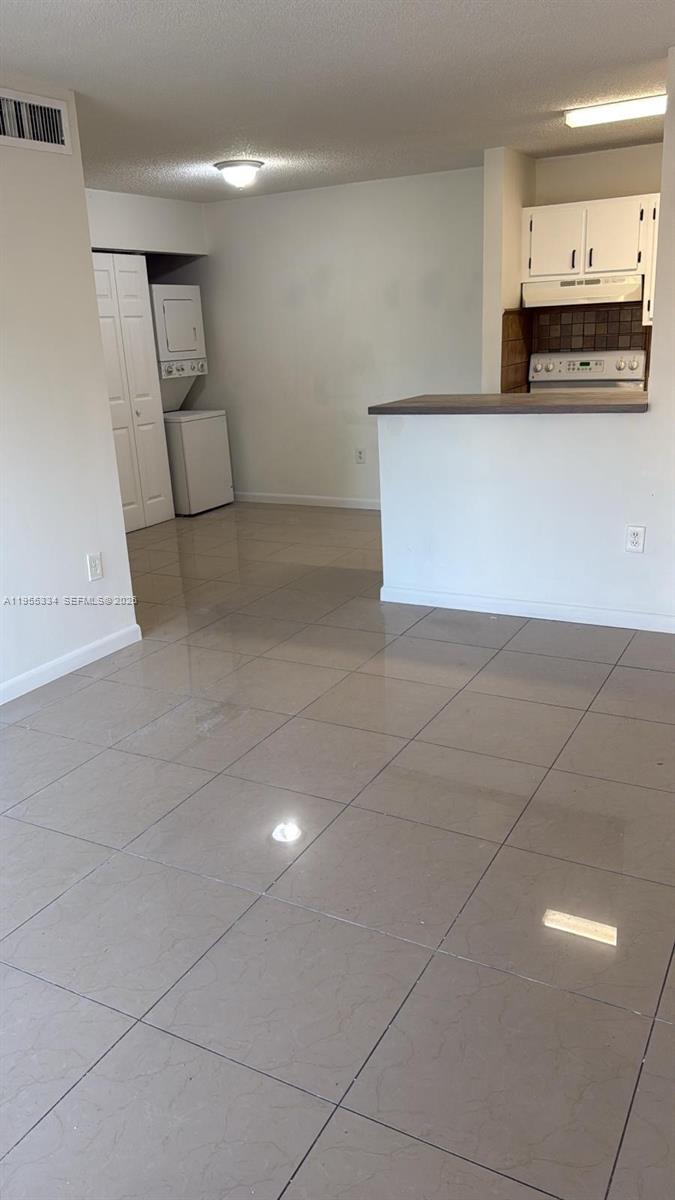 15620 Southwest 80th Street, Unit H203 Miami, FL 33193 - Photo 3 of 11 a view of a kitchen with a sink