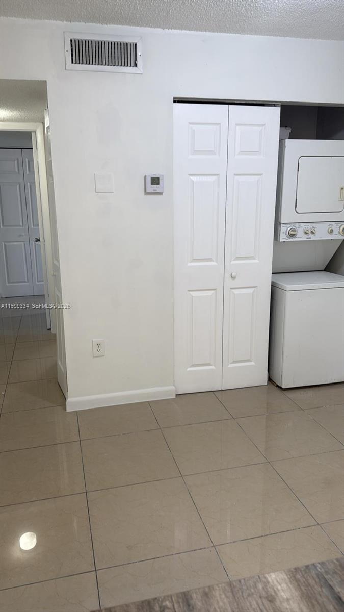 15620 Southwest 80th Street, Unit H203 Miami, FL 33193 - Photo 5 of 11 a view of a utility room with closet and windows