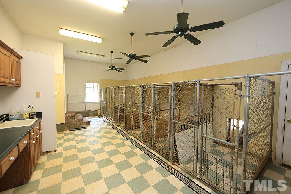 721 Beasley Road Louisburg, NC 27549 - Photo 4 of 4 Custom built by dog show owners this kennel area is perfect for your pups, a boarding business or a rescue! There's even a raised tub for ease of bathing the dogs!