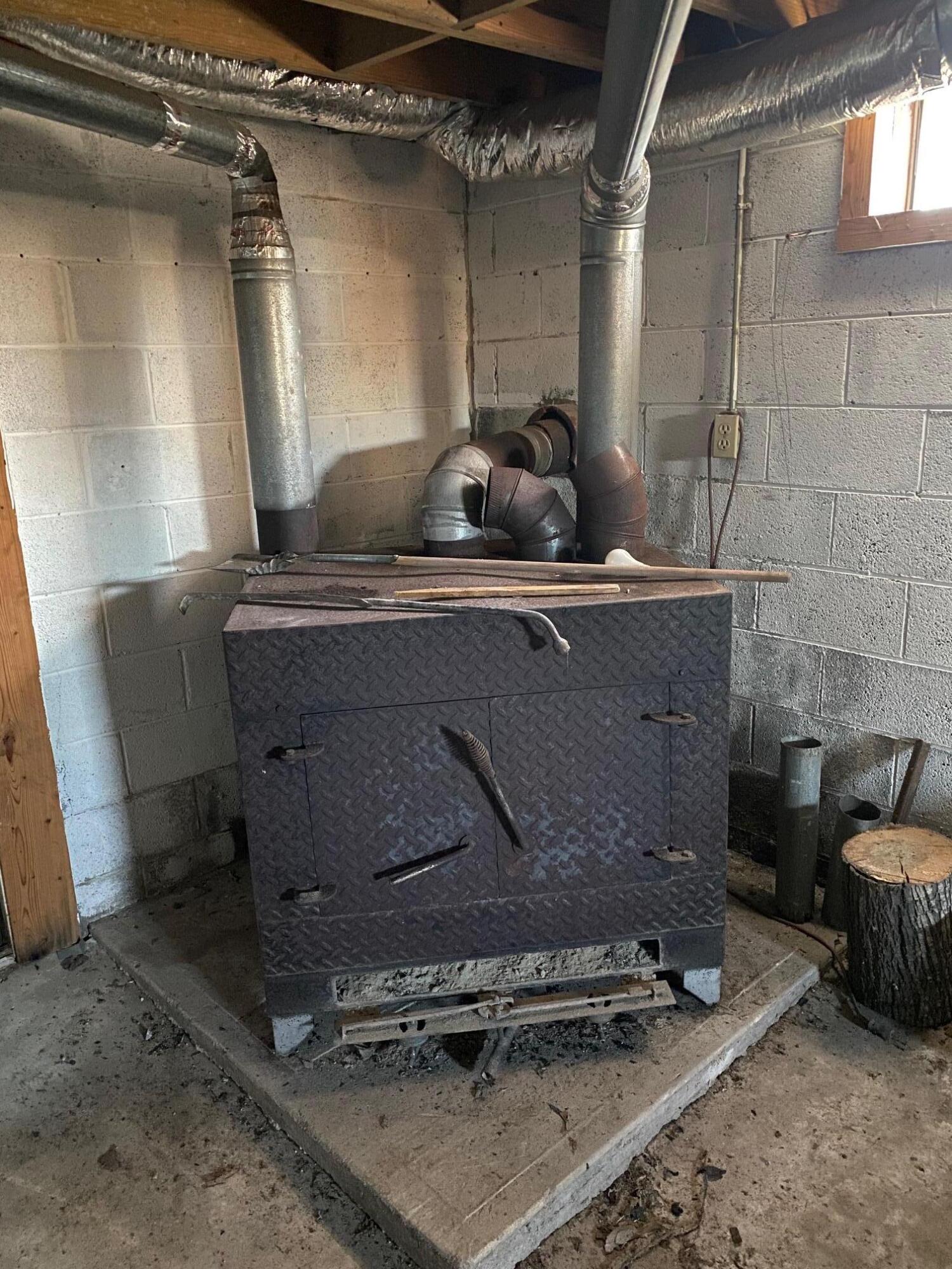 314 Round Knob Road Greeneville, TN 37743 - Photo 22 of 23 Round Knob Wood Stove in Basement