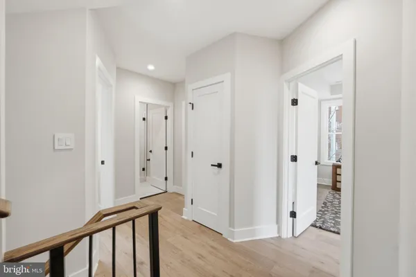 a bathroom with a double vanity sink mirror and shower