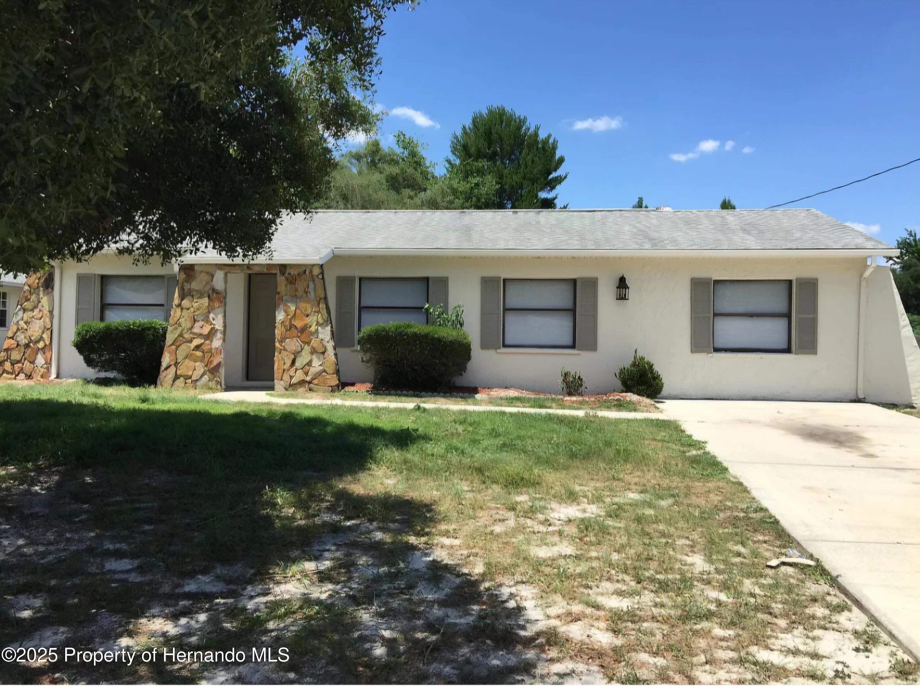 9619 Langan Street Spring Hill, FL 34606 - Photo 1 of 14