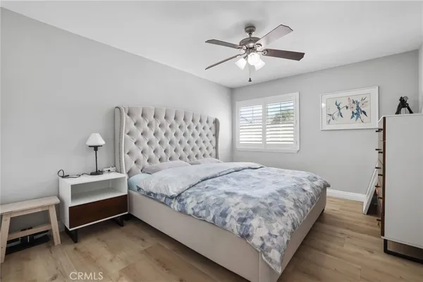 a bathroom with a sink a mirror and a shower