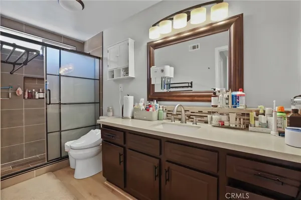 a bathroom with a sink and a shower