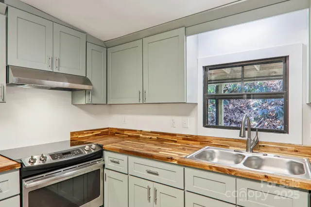 a white refrigerator freezer sitting in a kitchen