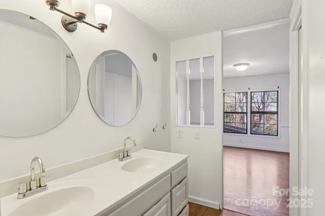 a view of cabinets and wooden floor