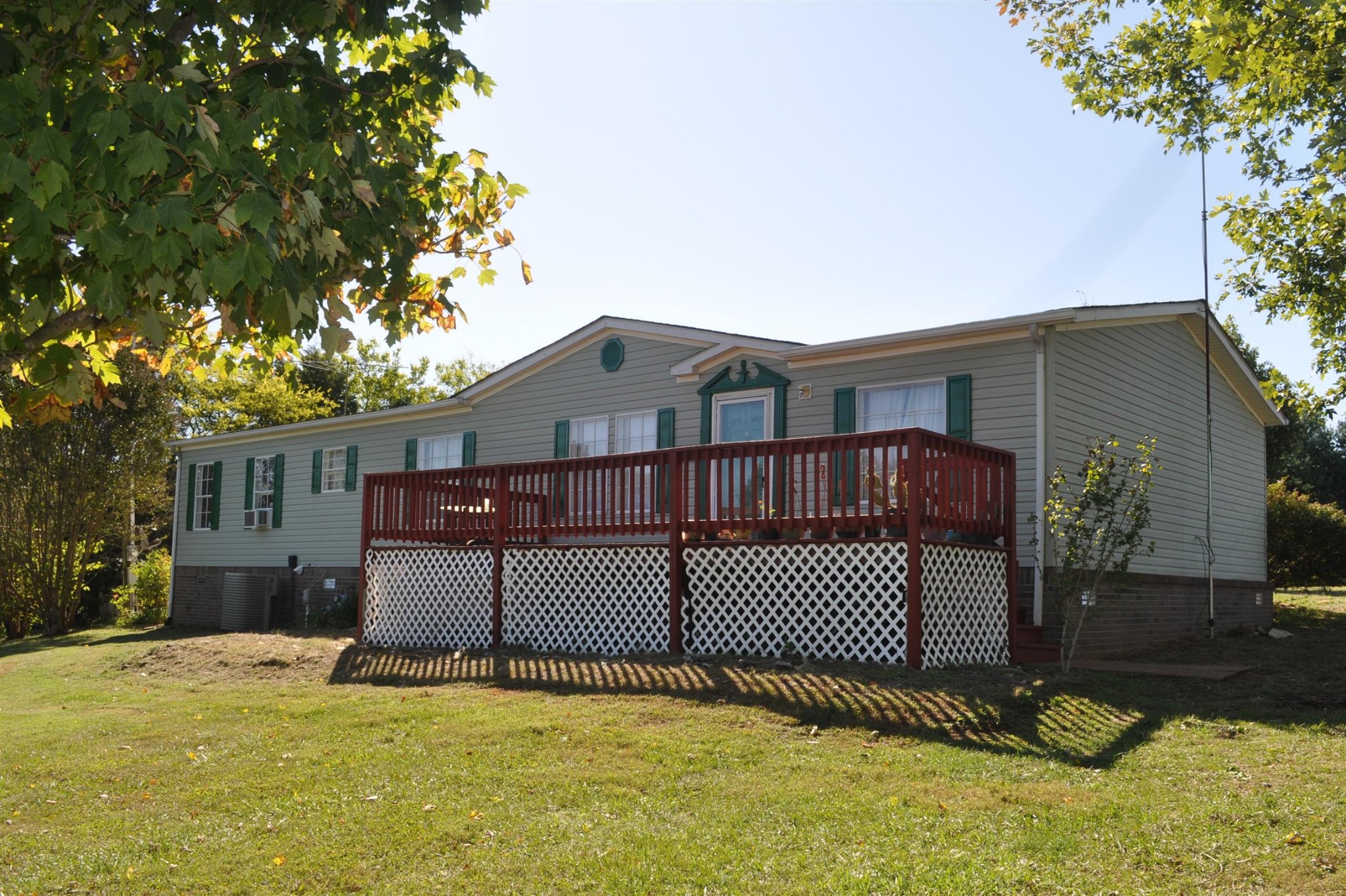245 North Centerpoint Road Portland, TN 37148 - Photo 1 of 18 a view of a house with a iron fence