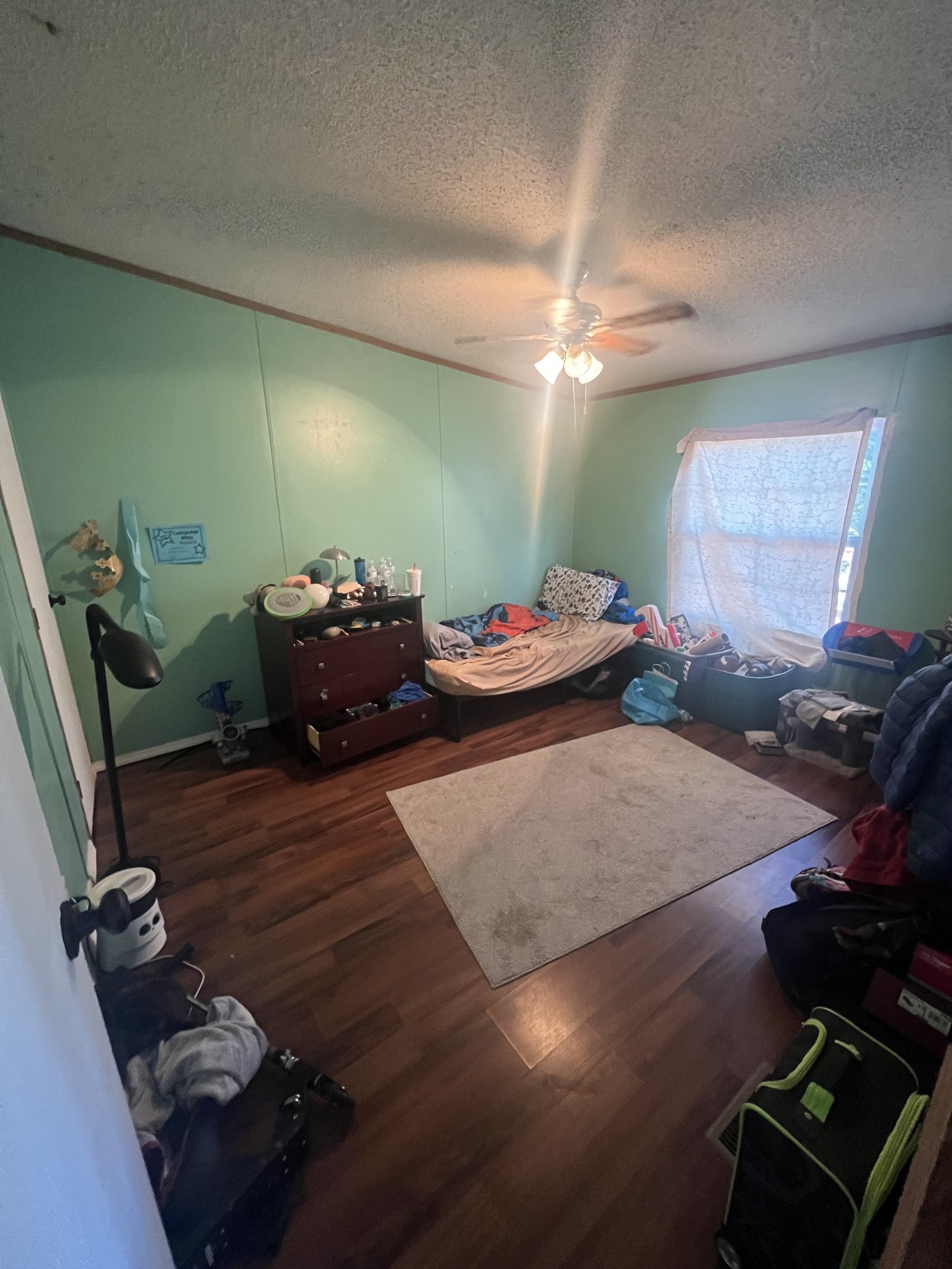 245 North Centerpoint Road Portland, TN 37148 - Photo 12 of 18 a bedroom with furniture and a chandelier