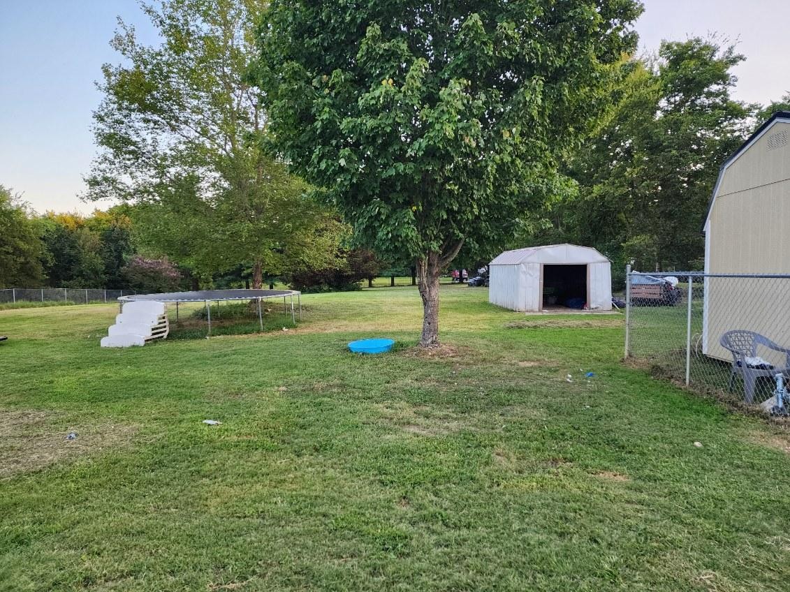245 North Centerpoint Road Portland, TN 37148 - Photo 18 of 18 a view of a house with a backyard
