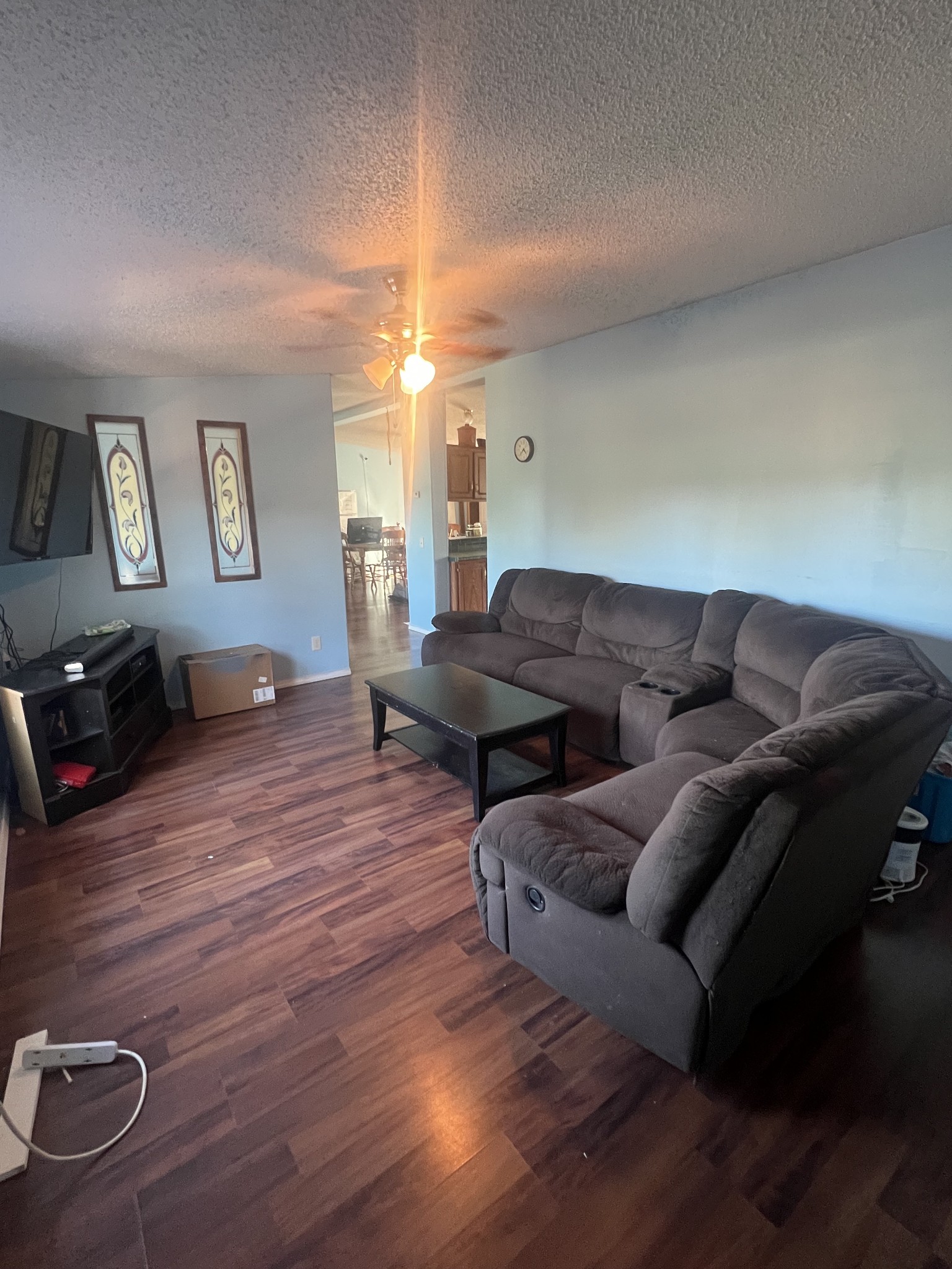 245 North Centerpoint Road Portland, TN 37148 - Photo 2 of 18 a living room with furniture and a chandelier