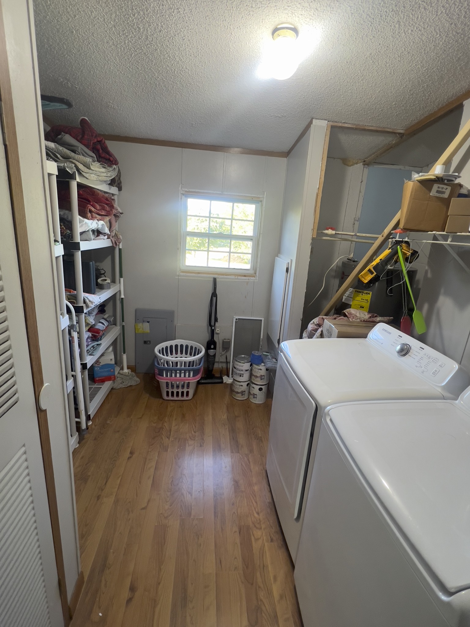 245 North Centerpoint Road Portland, TN 37148 - Photo 8 of 18 a storage room with washer and dryer