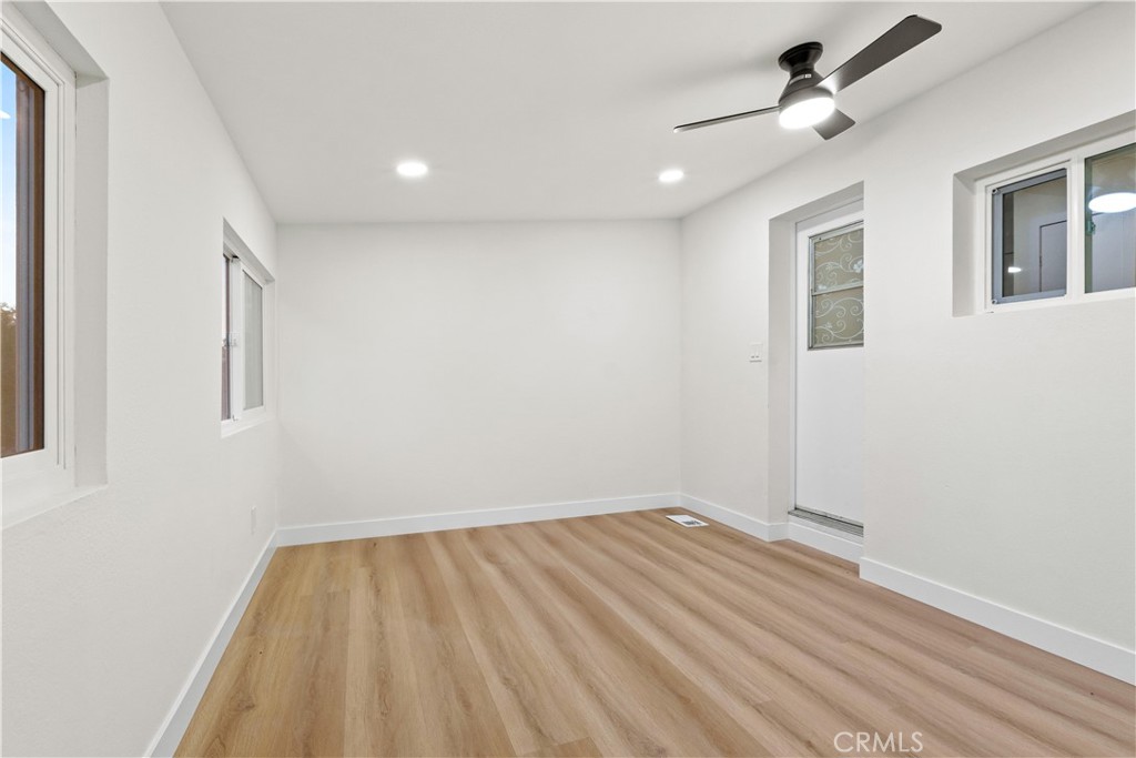 33195 Meyer Road Nuevo, CA 92567 - Photo 20 of 36 a view of room with wooden floor and fan