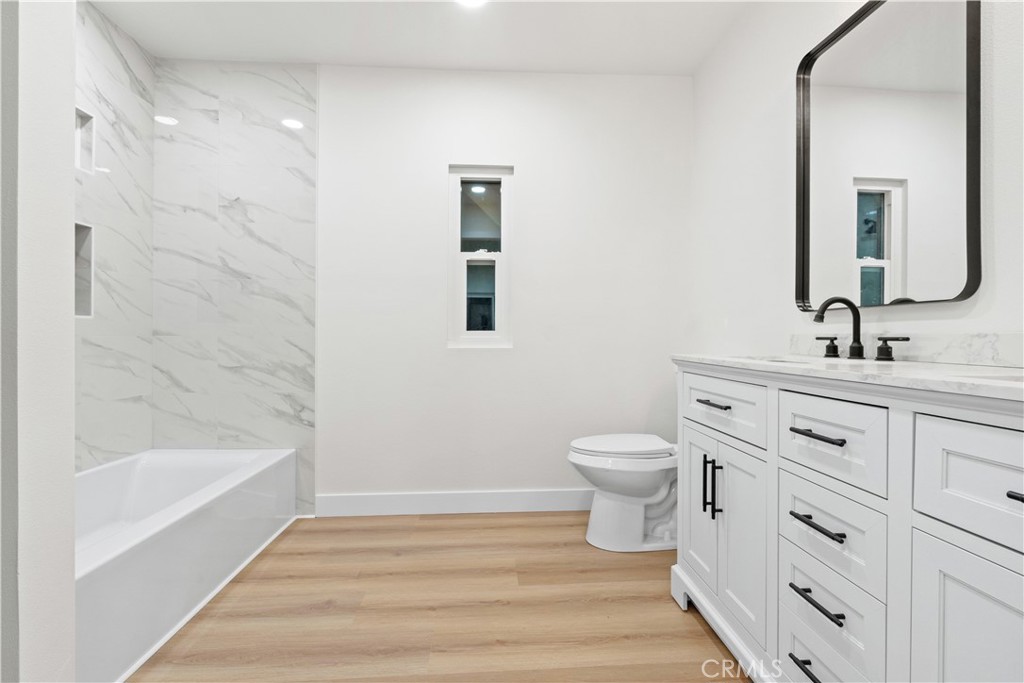 33195 Meyer Road Nuevo, CA 92567 - Photo 28 of 36 a bathroom with a sink a toilet and shower