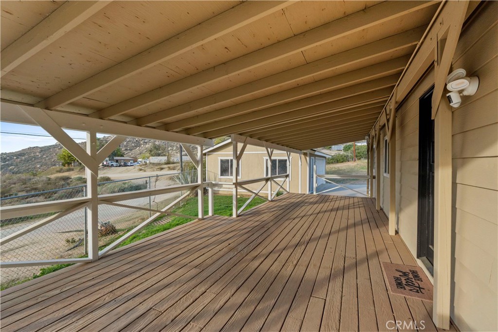33195 Meyer Road Nuevo, CA 92567 - Photo 6 of 36 a view of a balcony with wooden floor